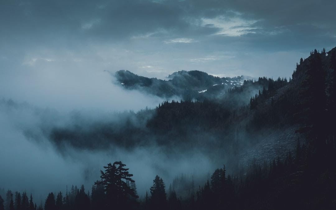 A dramatic misty mountian scene